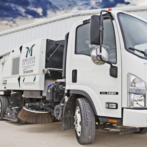 More Clean of Texas Sweeping Truck in front of More Clean of Texas