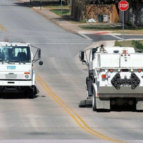 Sweepers passing on a roadway